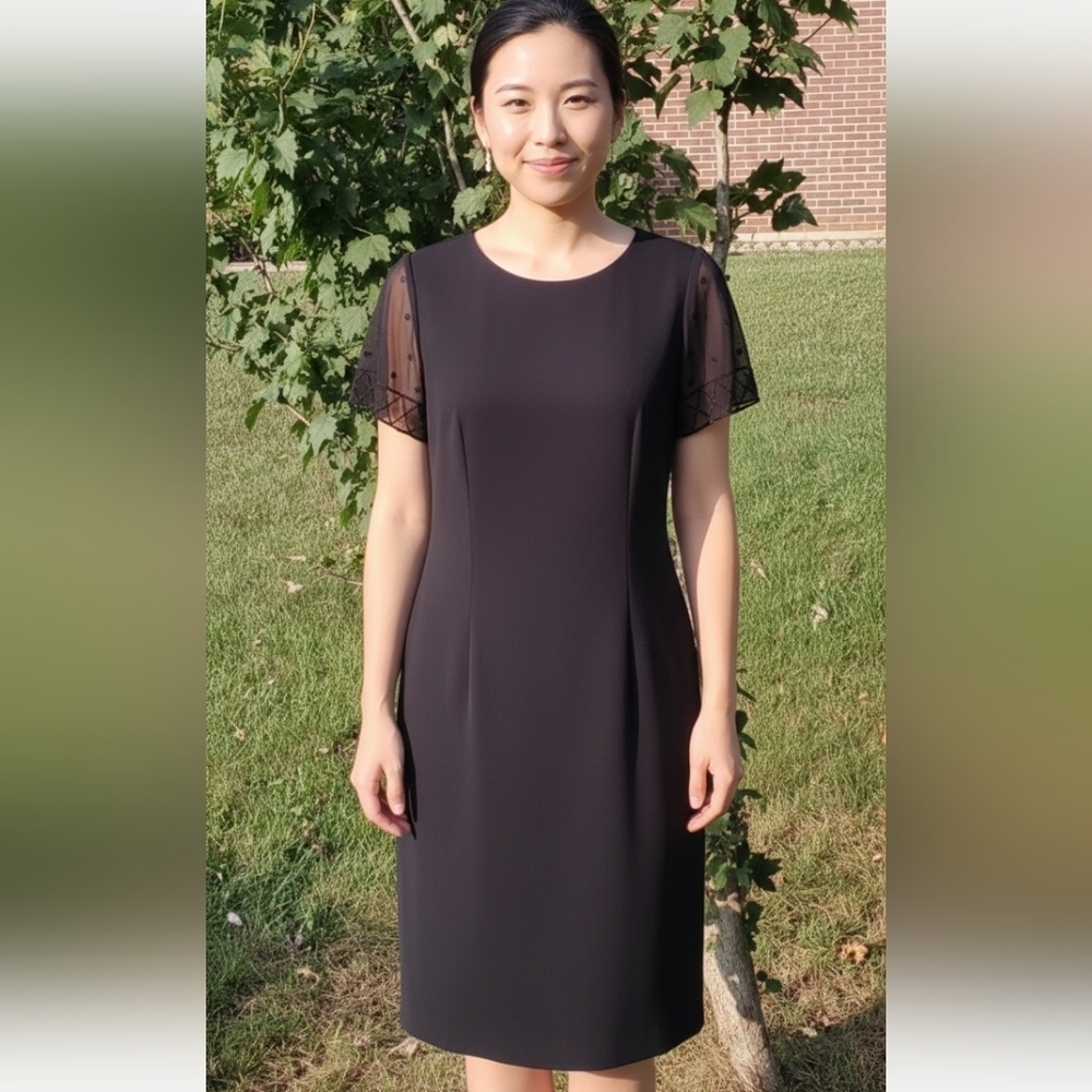 AGB black dress size 10 lacy beeded sleeve